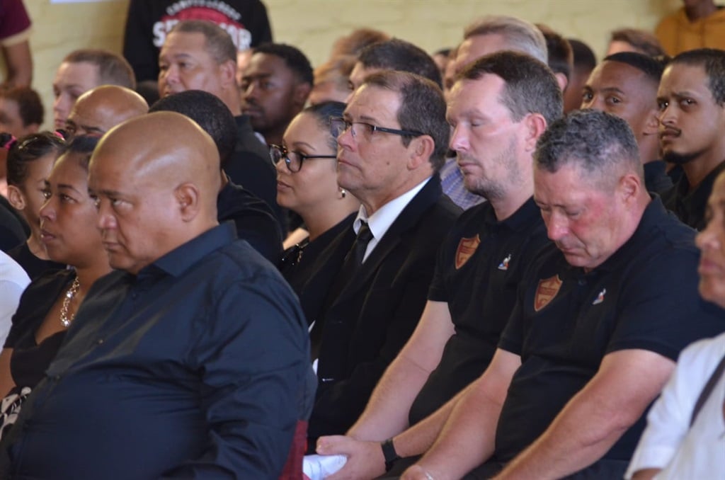 Hundreds of supporters, family and friends have gathered to bid farewell to Stellenbosch FC star Oshwin Andries.